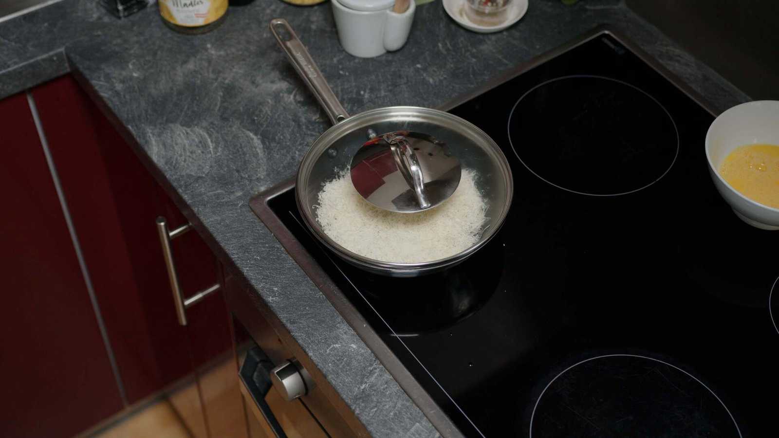 Cheese melting in a covered pan