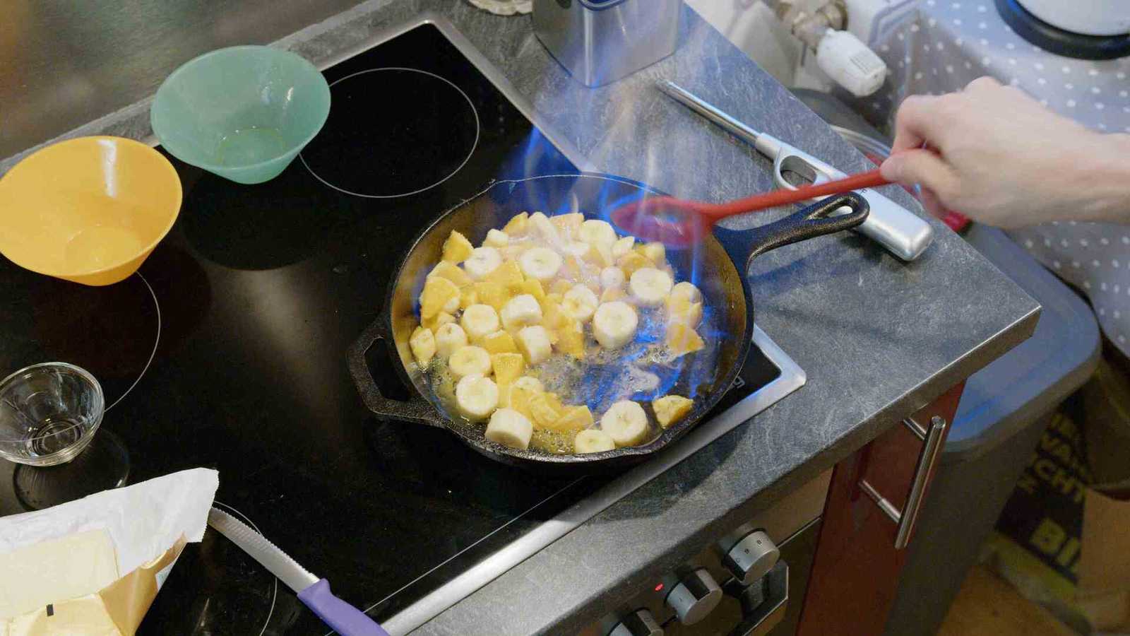 Fruits being mixed with flames