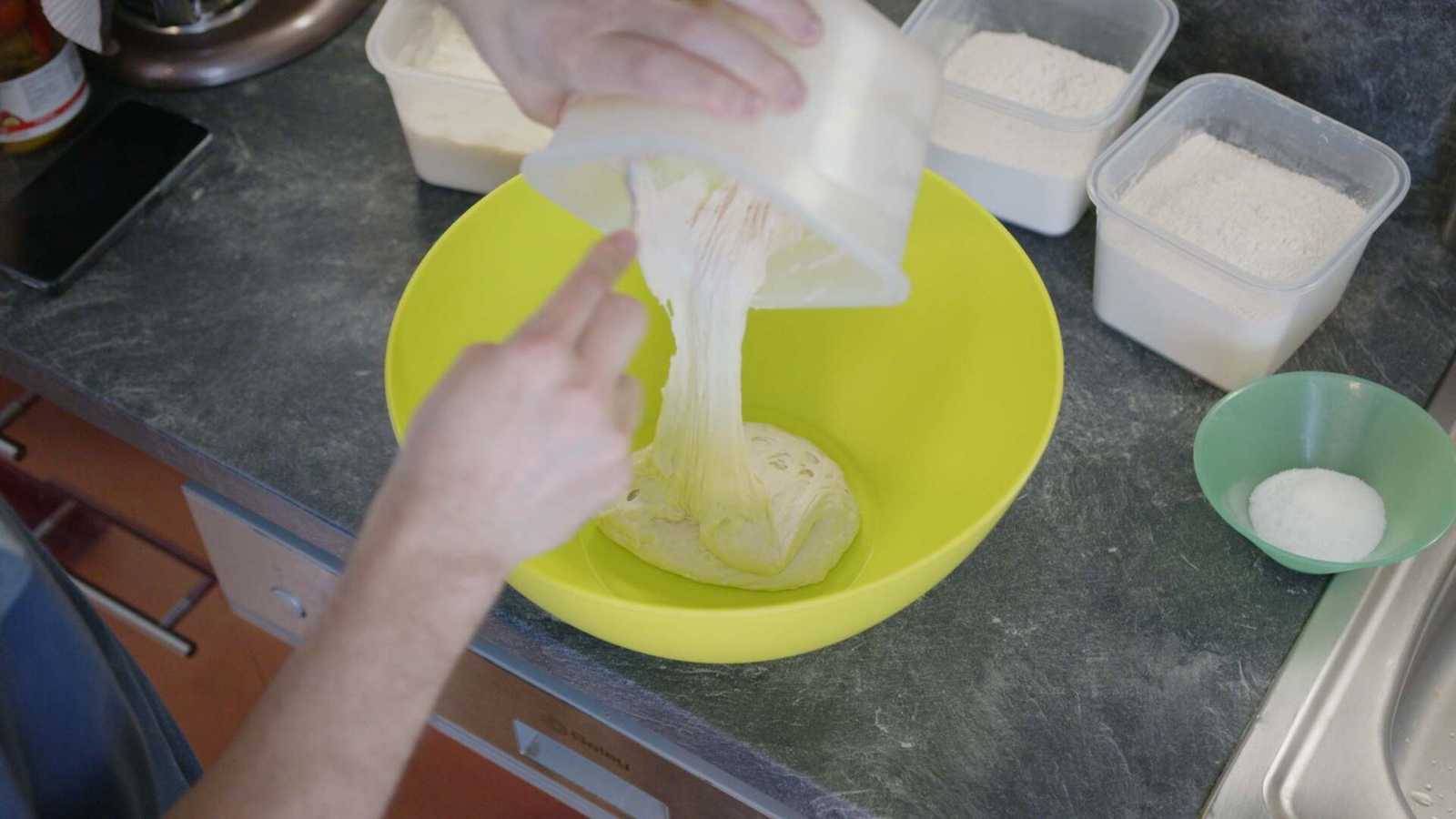 Poulish getting added into a large bowl