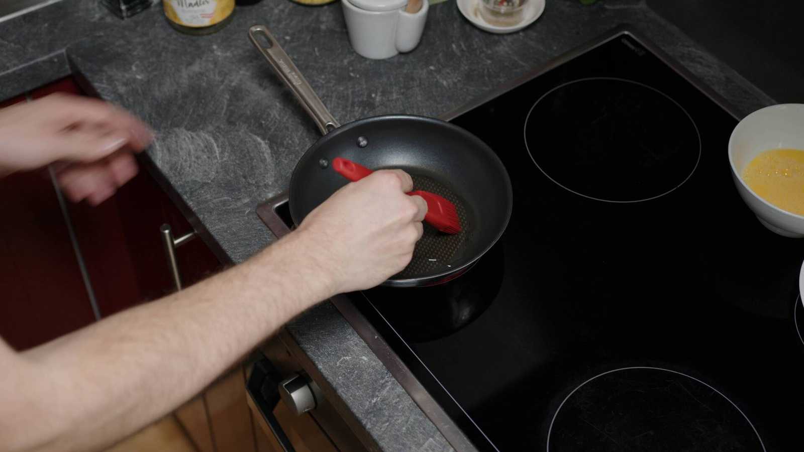 Oil being spread with a brush