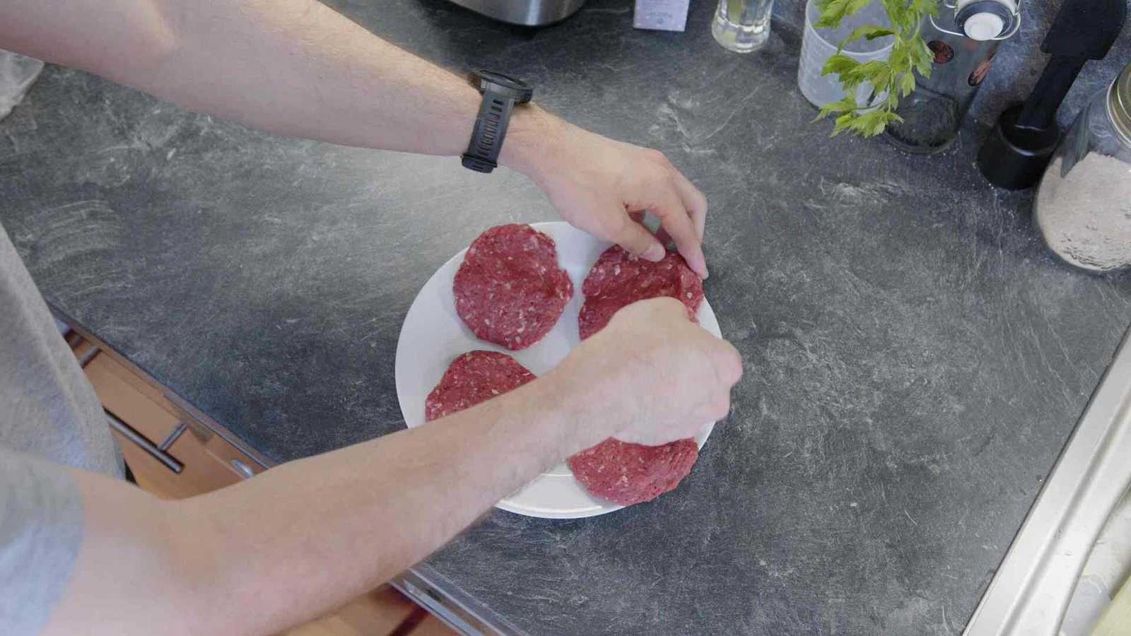 Four patties on a plate